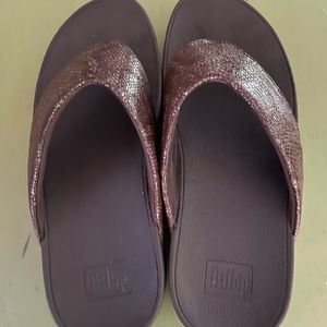 Women’s FitFlops in Shiny Brown.